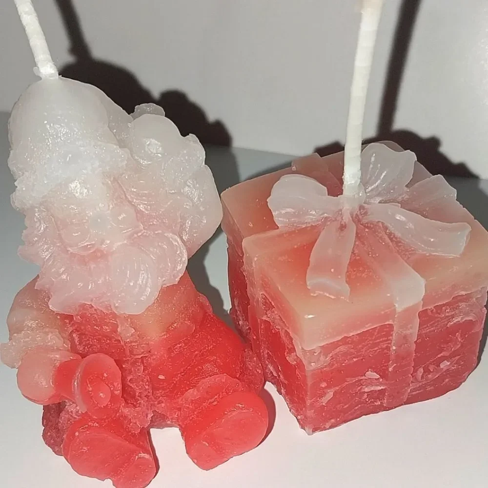 Hand crafted 2 piece holiday Santa's present candle set